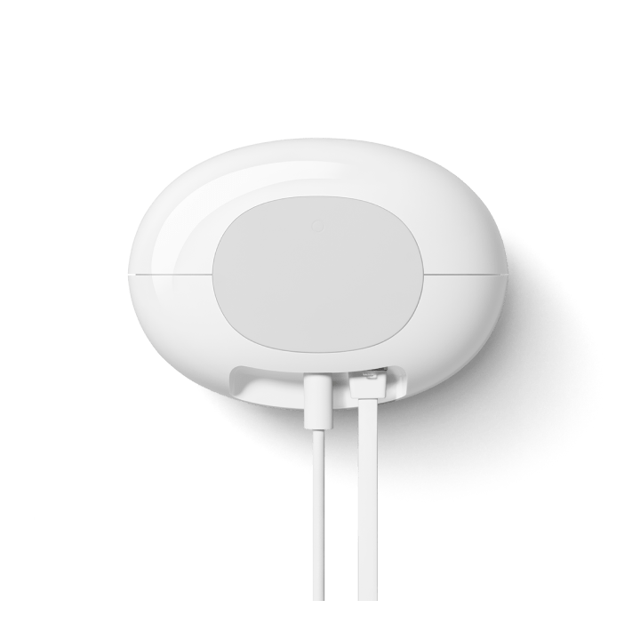 Bottom of a Snow-colored Nest Wifi Pro showing non-slip padding.