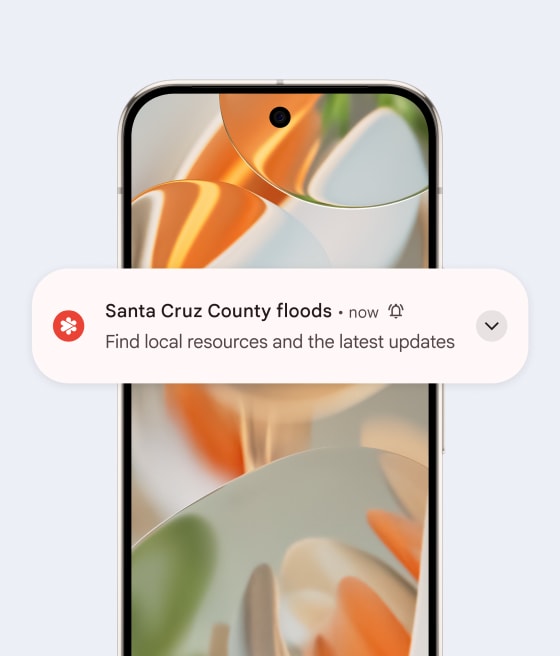 A Pixel phone displays a warning about Santa Cruz county floods.